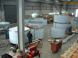 Installing pre-fabricated tanks